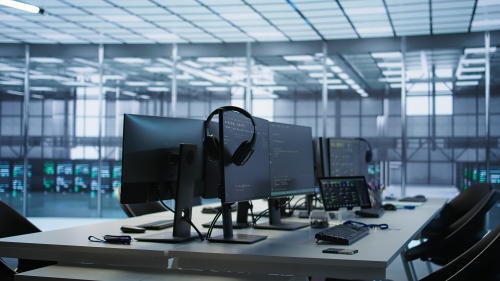Close up of coding software on tablet in server room