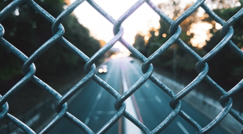 Freepik Wirestock, chainlink prison Freepik Wirestock, chainlink prison