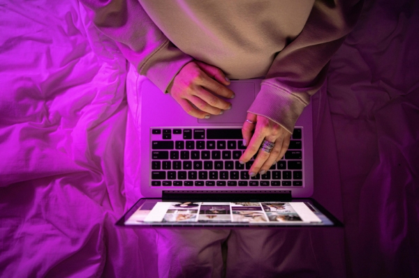 Pexels Maksim Goncharenok Person on laptop browsing ecommerce platforms