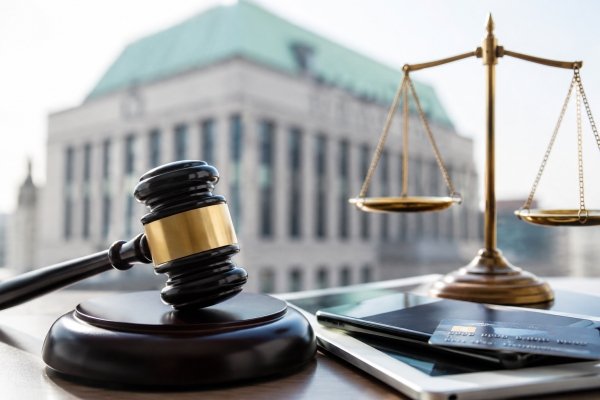 AI Image – Bank of Canada RPAA enforcement with gavel, scales of justice, smartphone and payment card